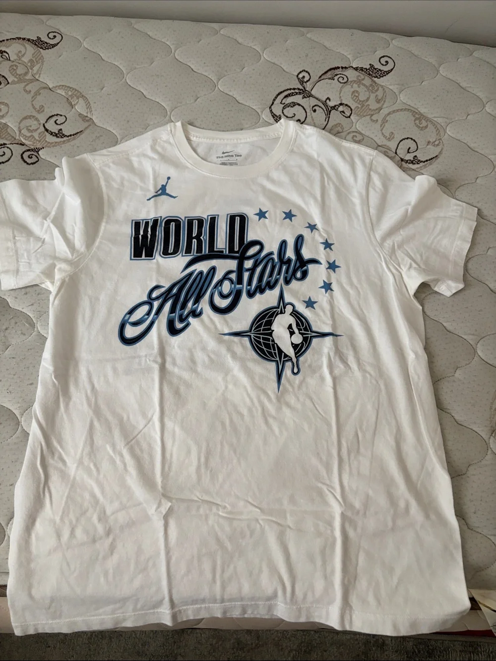 Jordan White Tee with Blue and Black World All-Stars Graphic Wemby shirt